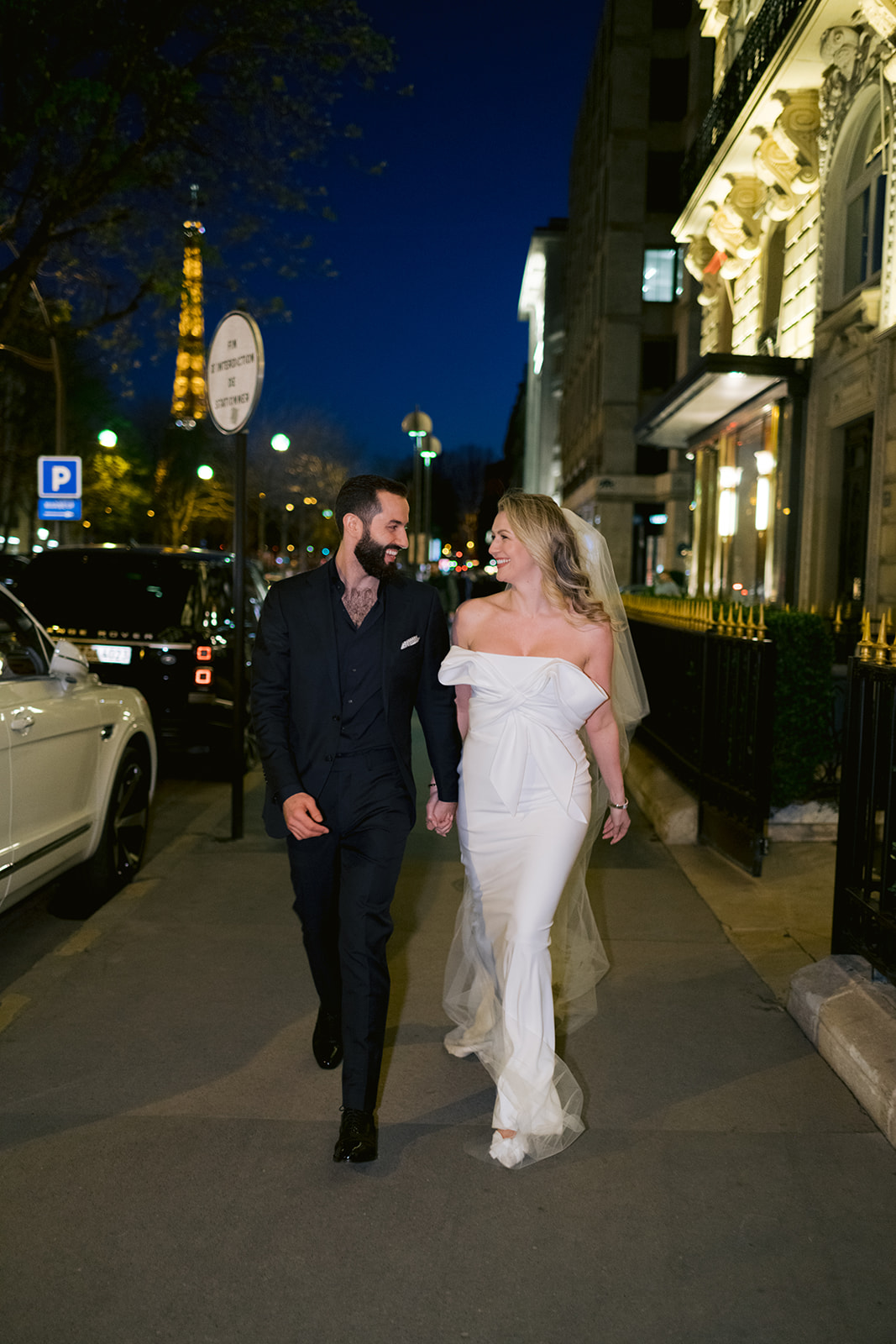 bride and groom on the street front plaza athénée